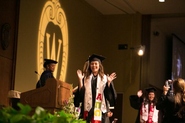 PEOPLE Scholar at College graduation