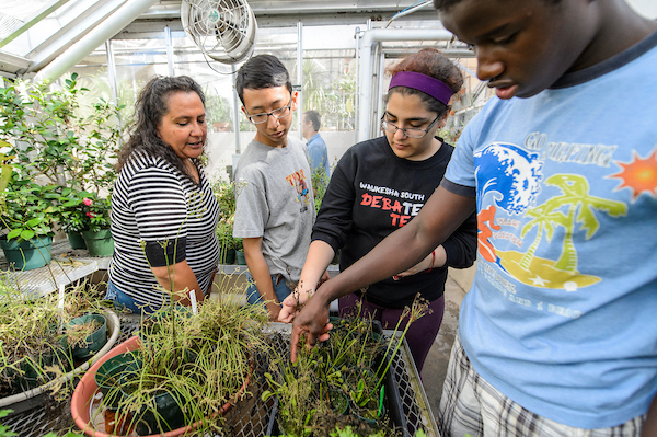 PEOPLE Students in a Greenhouse