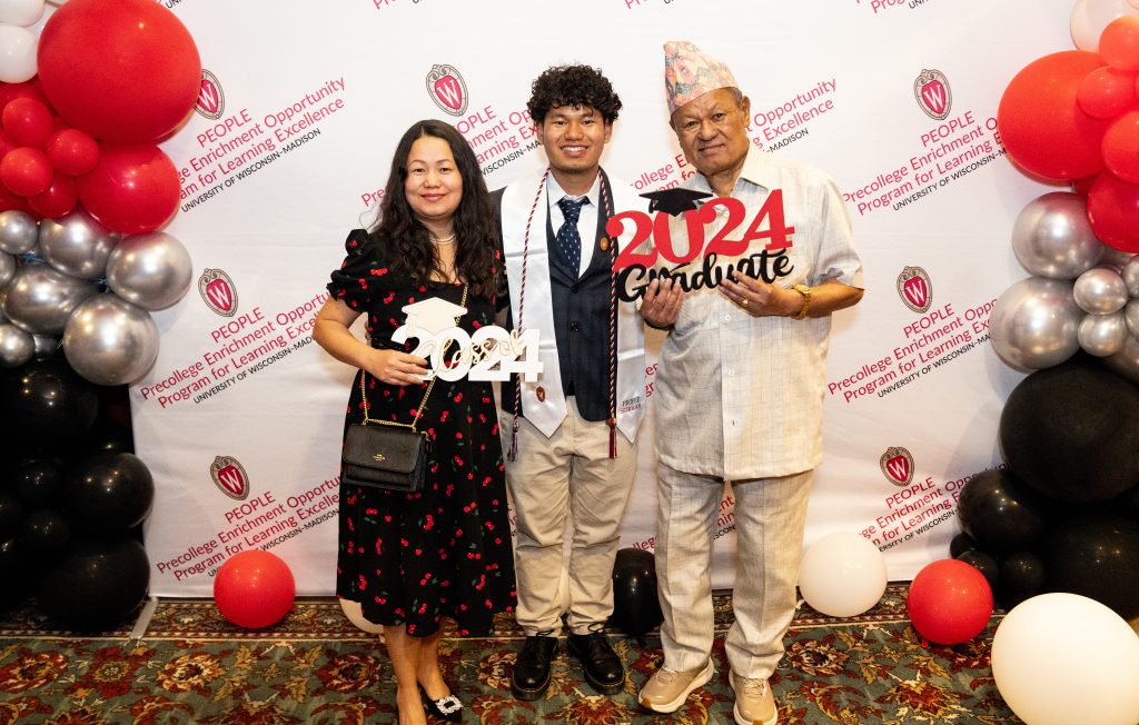 PEOPLE Scholar with family
