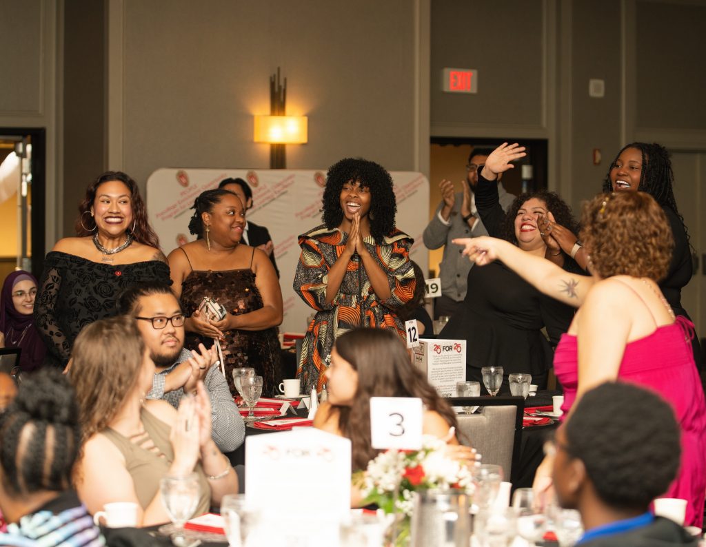 Attendees celebrating at the event